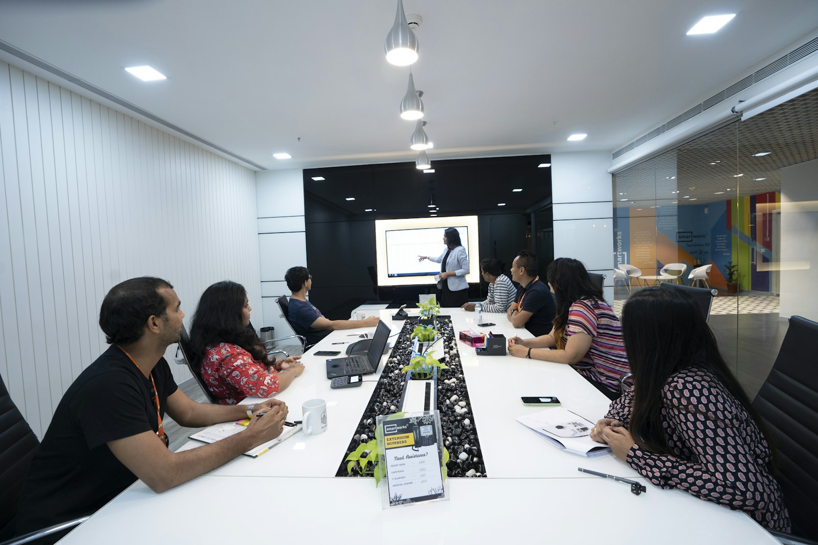 Professionals collaborating around a conference table